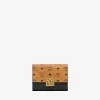New Arrivals Mcm (cognac/black Mena Trifold Wallet In Visetos Leather)