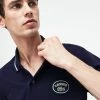 New Arrivals LACOSTE (Men's Navy Regular Fit Striped Accents Polo)
